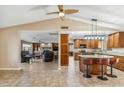 Modern kitchen with an island, custom cabinetry, and granite countertops at 1045 E Cloud Rd, Phoenix, AZ 85086