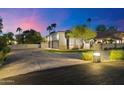 Spacious three-car garage with ample driveway space at 24218 N 85Th St, Scottsdale, AZ 85255