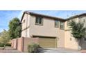 Two-story house with Spanish-style tile roof and attached garage at 7229 S 48Th Ln, Laveen, AZ 85339