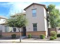 Two-story house with Spanish-style tile roof and landscaping at 7229 S 48Th Ln, Laveen, AZ 85339