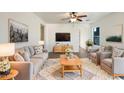 Bright living room featuring a neutral color palette and comfortable seating at 804 W Dana Dr, San Tan Valley, AZ 85143