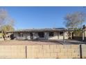 Ranch home with carport and block wall at 3418 W Roma Ave, Phoenix, AZ 85017