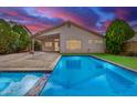 Stunning pool and patio area, perfect for outdoor entertaining at 4006 E Rockwood Dr, Phoenix, AZ 85050