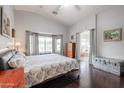 Large main bedroom with hardwood floors and en-suite bathroom at 684 S 231St Dr, Buckeye, AZ 85326