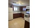 Bright kitchen features ample cabinetry and modern appliances at 2541 E Illini St, Phoenix, AZ 85040