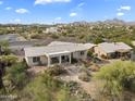 House with a large backyard and mountain backdrop at 12411 N Fountain Hills Blvd, Fountain Hills, AZ 85268