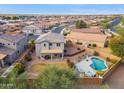 House with backyard pool and spa, aerial view at 2924 N Taylor Ln, Casa Grande, AZ 85122