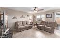 Living room with two recliner chairs and tile floors at 3630 N French Pl, Casa Grande, AZ 85122