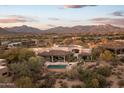 Luxury estate home with a private pool and spa, plus mountain views at 10125 E Sundance Trl, Scottsdale, AZ 85262