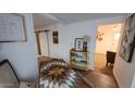 Wood dining table with chairs in a bright dining area at 110 N Pinal Ave, Superior, AZ 85173