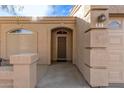 Front entry with security door and adjacent garage at 2101 S Yellow Wood -- # 89, Mesa, AZ 85209