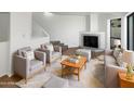 Inviting living room with comfortable seating, a fireplace, and stylish decor at 3228 W Glendale Ave # 118, Phoenix, AZ 85051