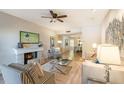 Living room with fireplace, comfortable furniture, and stylish decor at 5200 S Lakeshore Dr # 204, Tempe, AZ 85283