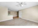Open living room featuring hardwood floors and ceiling fan at 5995 N 78Th St # 2050, Scottsdale, AZ 85250