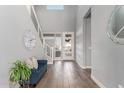 Bright and spacious entryway with tile floors and modern staircase at 10157 E Texas Ave, Mesa, AZ 85212