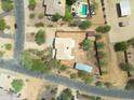 Aerial view showing home, pool, and surrounding landscape at 501 E Desert Hills Estate Dr, Phoenix, AZ 85086