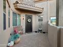 Inviting courtyard entryway with decorative metal door at 6202 E Mckellips Rd # 66, Mesa, AZ 85215