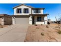 Two-story house with gray shutters and a neutral color scheme at 7460 E Hackamore Ln, San Tan Valley, AZ 85143