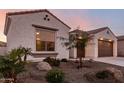 House exterior showcasing landscaping and garage at 3188 N 167Th Dr, Goodyear, AZ 85395