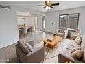 Bright living room with comfy seating and dining area at 1433 N 53Rd Ave, Phoenix, AZ 85043