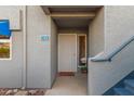 View of the front door and entrance area of a condo unit at 220 N 22Nd Pl # 1108, Mesa, AZ 85213