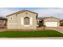 Well-maintained house featuring a two-car garage and attractive landscaping at 9982 W Villa Chula --, Peoria, AZ 85383