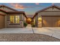 Charming courtyard entry with a pathway and well-manicured landscaping at 1835 W Kingbird Dr, Chandler, AZ 85286