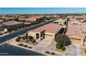 An aerial view showcases this single-story home in a well-established and quiet neighborhood at 21504 E Pecan Ct, Queen Creek, AZ 85142