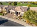 Beautiful single-story home with a tile roof and a well-manicured landscape at 36011 N Stoneware Dr, Queen Creek, AZ 85140