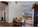 Dining area with large window showcasing scenic mountain views at 42609 N 19Th St, New River, AZ 85087