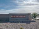 Estrella Crossing community entrance sign welcomes residents and visitors at 5510 W Paseo Way, Laveen, AZ 85339