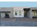 Modern home exterior with gray and stone accents at 10835 N Cherry Hills Ct, Fountain Hills, AZ 85268