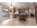 Spacious kitchen featuring an island and stainless steel appliances at 563 E Krista Way, Tempe, AZ 85284