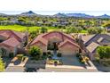 Luxury home with mountain views and a golf course nearby at 9471 E Cavalry Dr, Scottsdale, AZ 85262