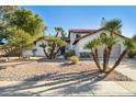 Lovely Spanish style home with mature trees and landscaping at 10587 E Caron St, Scottsdale, AZ 85258