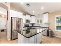 Modern kitchen with stainless steel appliances and granite countertops at 21836 W Hopi St, Buckeye, AZ 85326