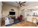 Spacious living room with hardwood floors and open floor plan at 21836 W Hopi St, Buckeye, AZ 85326