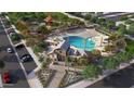 Aerial view of community pool, clubhouse, and surrounding amenities at 13457 N 158Th Ave, Surprise, AZ 85379
