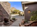 Landscaped courtyard with fountain and mountain views at 10821 E Tusayan Trl, Scottsdale, AZ 85255