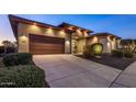 Beautiful home exterior with a modern design and landscaping at 30138 N 133Rd Ln, Peoria, AZ 85383