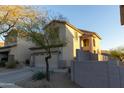 Two-story house with attached garage and desert landscaping at 333 E Redwood Ln, Phoenix, AZ 85048