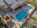 Aerial view showcasing the home's private pool and backyard at 18088 W Narramore Rd, Goodyear, AZ 85338