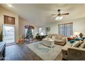 Spacious living room with hardwood floors and a cozy atmosphere at 657 N Gregory Pl, Chandler, AZ 85226