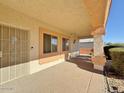 Covered patio with access to the home's interior at 11100 W Magdalena Dr, Arizona City, AZ 85123