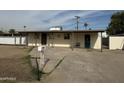 Ranch home with carport and front yard at 3914 W Monte Vista Rd, Phoenix, AZ 85009