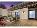 Relaxing patio with outdoor seating and pergola at 8508 E Mustang Trl, Scottsdale, AZ 85258