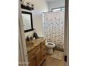 Charming bathroom with granite countertop and wooden vanity at 8990 E Sonoran Way, Gold Canyon, AZ 85118