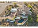 Stunning aerial view of a beautiful home with a private pool and expansive grounds at 15528 E Golden Eagle Blvd, Fountain Hills, AZ 85268