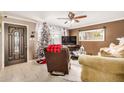 Living room with Christmas tree and comfy furniture at 4902 W Sheridan St, Phoenix, AZ 85035