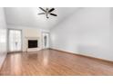 Bright living room with hardwood floors, fireplace, and lots of natural light at 17633 N Lindner Dr, Glendale, AZ 85308